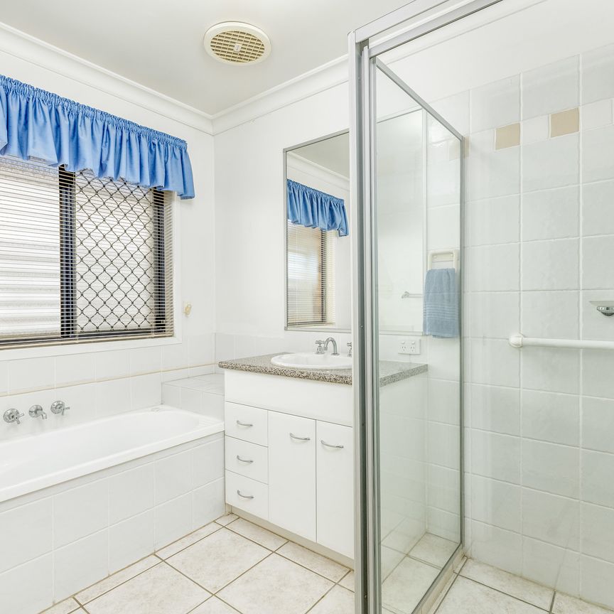 Lovely 4 Bedroom home with Side Access - Photo 1