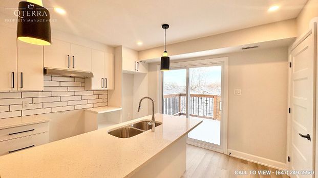 BEAUTIFUL 2-BEDROOM MAIN LEVEL UNIT WITH MODERN UPGRADES - Photo 1