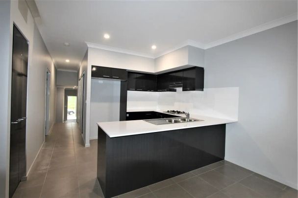 “Near New Four Bedroom Home” - Photo 1