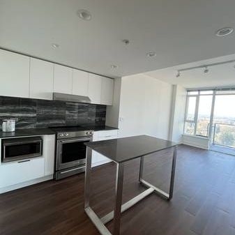 Bright 1 Bed + Den - Available Now - Photo 4