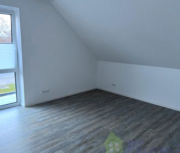 Moderne 2-Zimmer-Oberwohnung mit Balkon in Warsingsfehn! - Foto 2