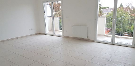 Location appartement 2 pièces, 60.24m², Sainte-Geneviève-des-Bois - Photo 2