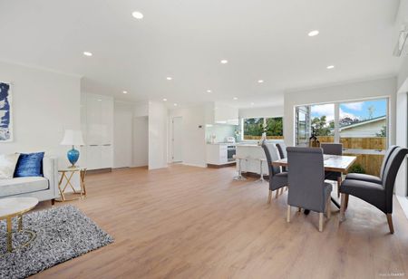 This modern 5-bedroom home offers space, comfort, and a great location - Photo 3