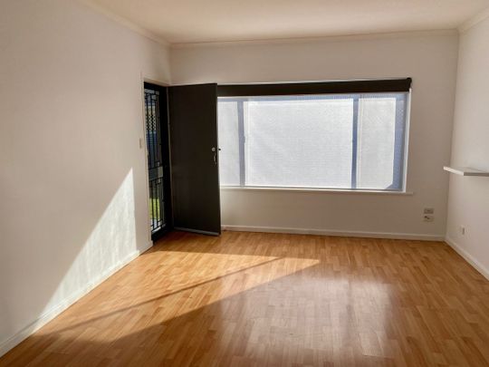 Appealing Unit With Two Private Courtyards - 5 MONTH LEASE - Photo 1