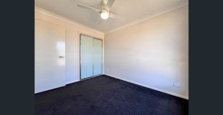 NEAR NEW 4 BEDROOM HOME - Photo 5