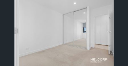 TOP FLOOR LIVING WITH WRAPAROUND BALCONY - UNFURNISHED - Photo 2