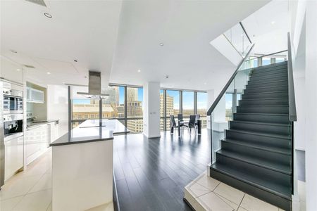 An extremely spacious two bedroom duplex apartment located on the 21st and 22nd floors of the ever popular No 1 West India Quay. - Photo 4