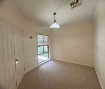 Modern Three-Bedroom Home in a Beautiful Tree-Lined Street - Photo 5