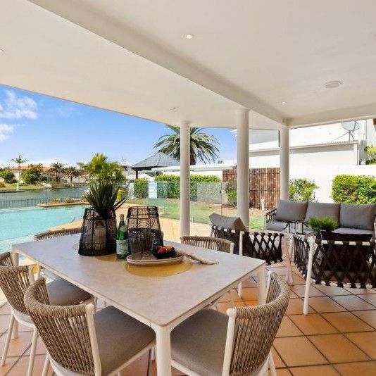 Stunning Canal-Front Home with Pontoon â Convenience Meets Lifestyle - Photo 1