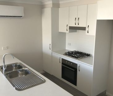 NEAR NEW 4 BEDROOM HOME - Photo 1