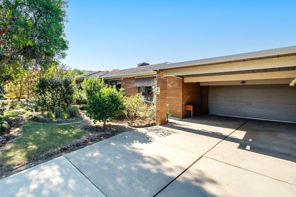 Modern Comfort and Family Convenience in Prime Location - Photo 1