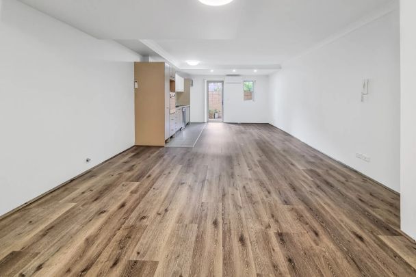 RENOVATED 3 BEDROOM DOUBLE STOREY APARTMENT WITH NEW FLOORING THROUGH-OUT - Photo 1