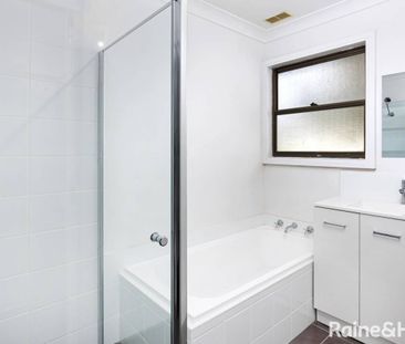 FRESHLY UPDATED FAMILY HOME - Photo 6