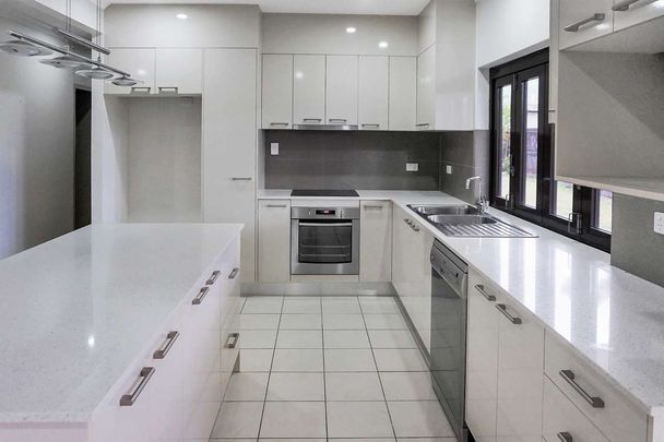 Stylish Home on Corner Block with Secure Yard - Photo 1