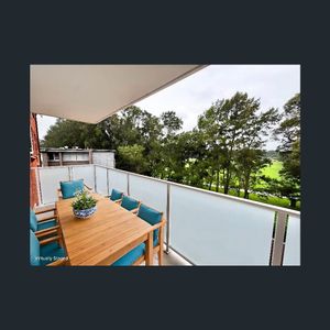 Bright Coastal Apartment with Leafy Outlooks - Photo 3