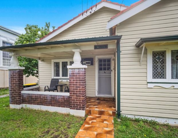 Three-Bedroom Home with Spacious Backyard - Photo 1