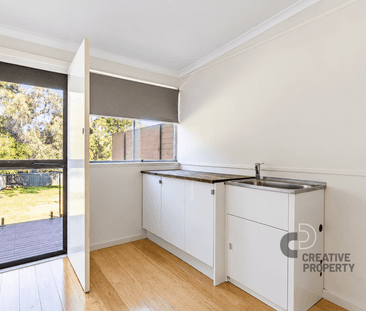 Spacious Two-Bedroom Flat with Private Outdoor Entertaining - Photo 6