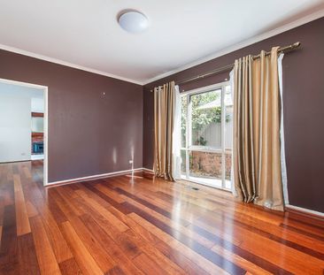 Spacious Four-Bedroom, North-Facing Family Home with Solar Savings - Photo 1