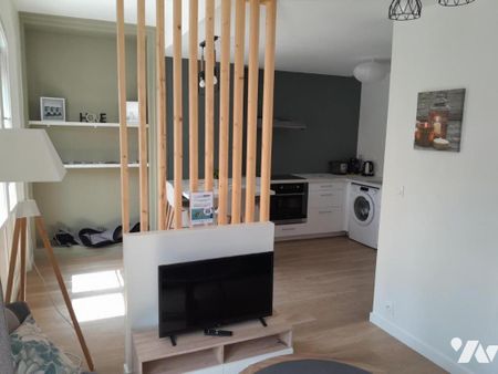 A LOUER APPARTEMENT MEUBLE T2 LAVAL - Photo 2