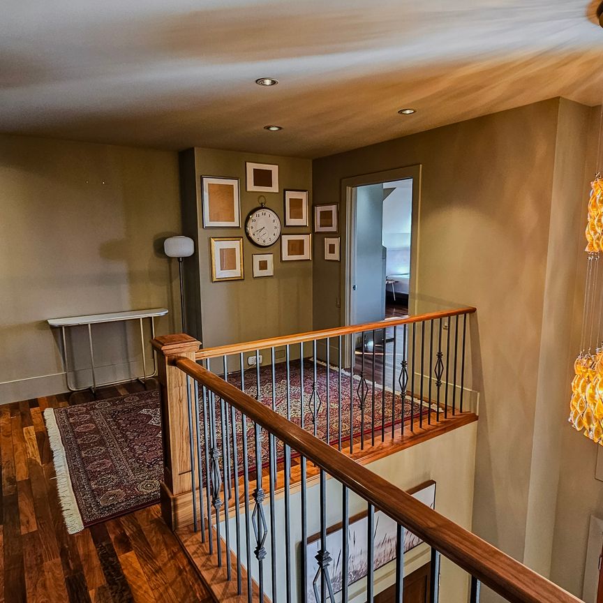 Executive Furnished 5 Bedroom Home With Walkout Basement In Aspen Woods - Photo 1