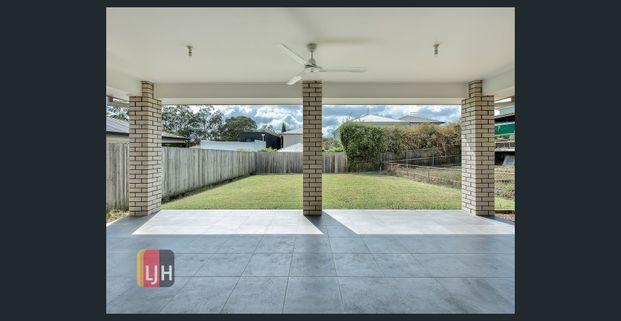 SPACIOUS AND AIR CONDITIONED 4 BEDROOM HOME - Photo 1