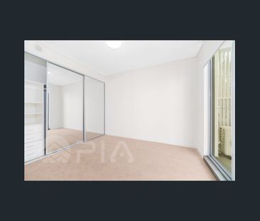 Modern 2 bedroom apartment close to amenities for lease - Photo 2