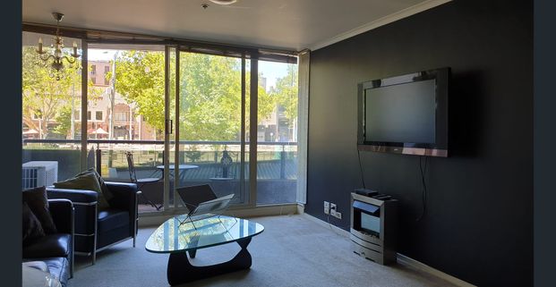 CONVENIENT, SPACIOUS & FURNISHED - Photo 1