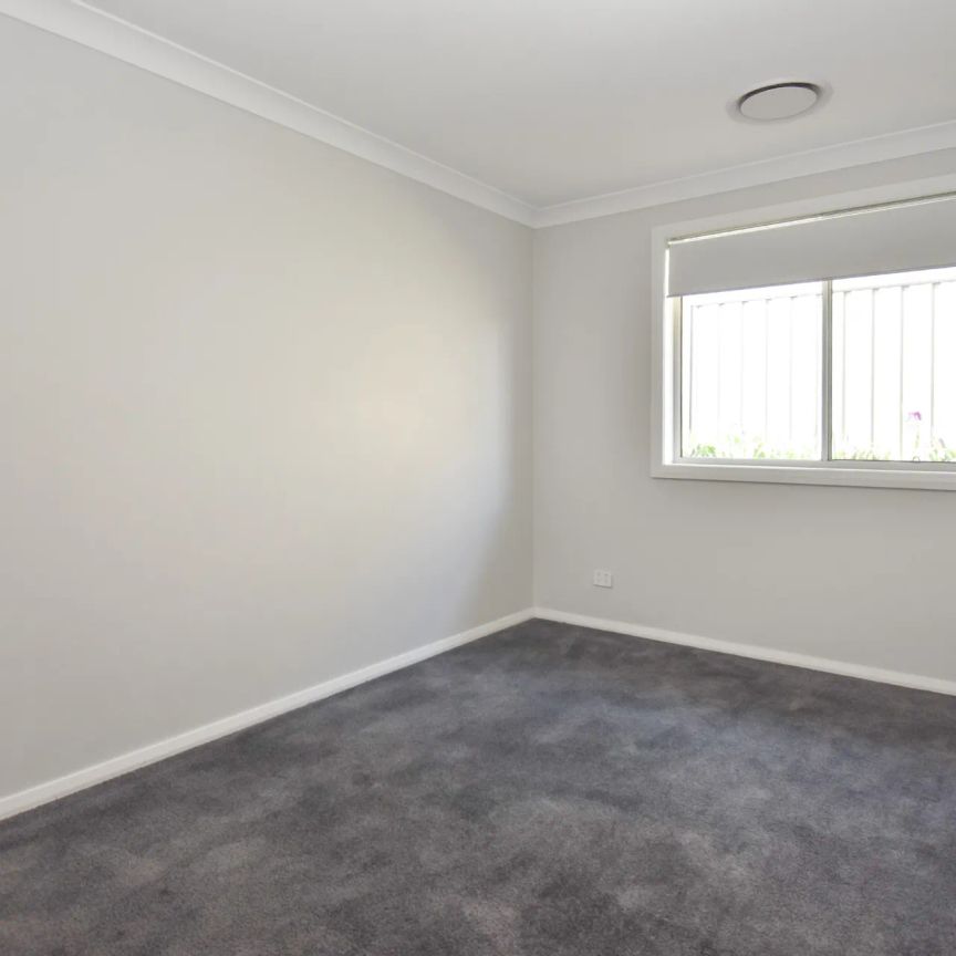 Family Home with Versatile Living Areas - Photo 1