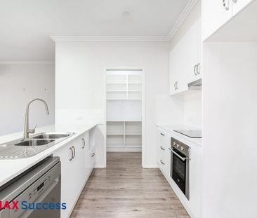 Modern and Relaxed Family Living in Sought-After Westbrook - Photo 6