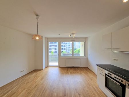 Sonnige 1+ Zimmer Neubauwohnung mit großer SÜD-Loggia - Photo 2