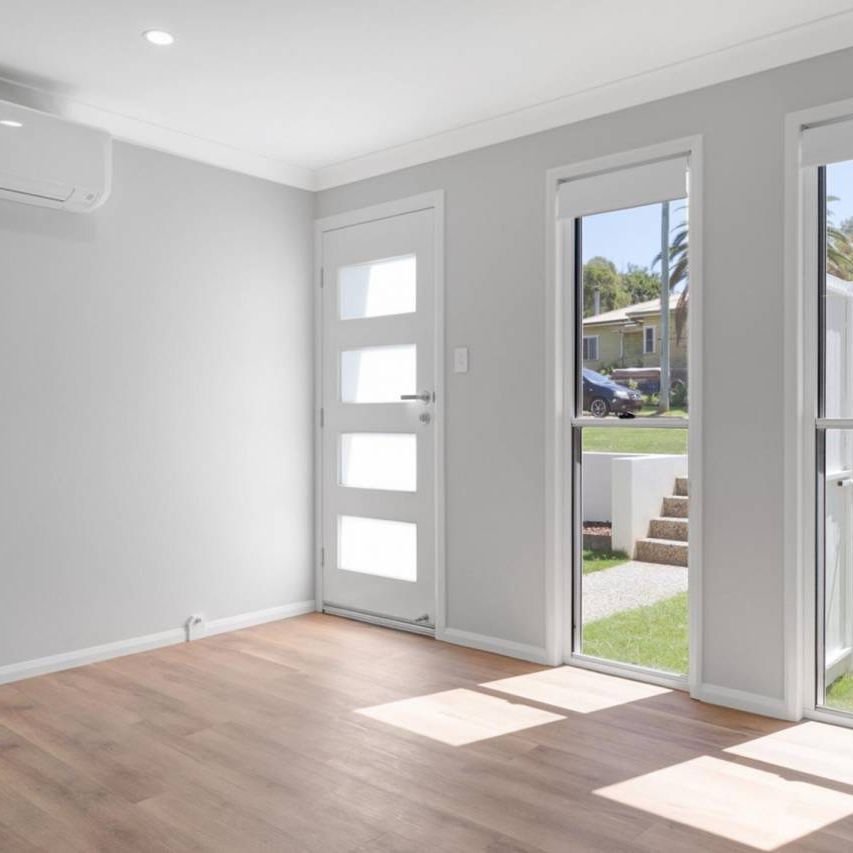 Brand New | Premium Living in the Heart of Newtown - Photo 1