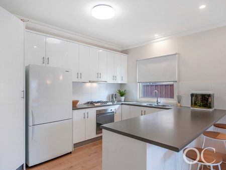 Open the Door To Stylish Living in the Heart of Kensington - Photo 2