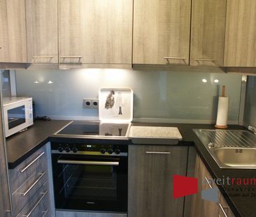 Hellern, stilvoll eingerichtetes Apartment mit Tiefgaragenstellplat... - Foto 1