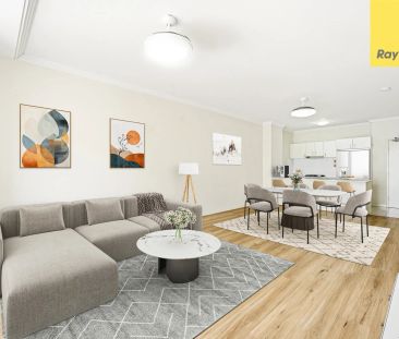 Modern & Fresh: Renovated 2-Bed Unit with Brand New Floating Floors - Photo 3