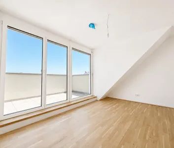 Erstbezug: Moderne 2-Zi-DG-Wohnung mit Balkon, Klimaanlage & Aufzug in 1100 Wien! - Photo 3