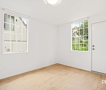 Freshly Renovated 3-Bedroom Duplex - Photo 2