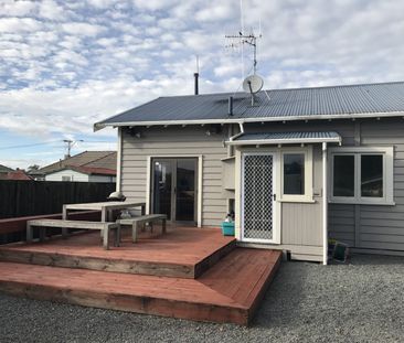 This well-maintained property offers the ideal combination of space... - Photo 2