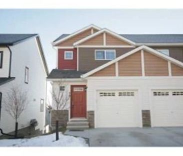 LOWEST PRICE EVER! Fantastic 2 storey walkout townhouse in Panorma Hills. — 3 Bedrooms Townhouse - Photo 1