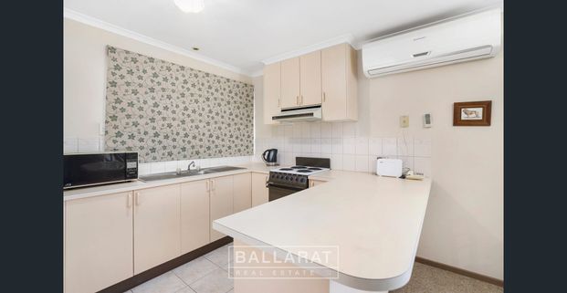 SPACIOUS UNIT IN QUIET AND CONVENIENT LOCATION - Photo 1