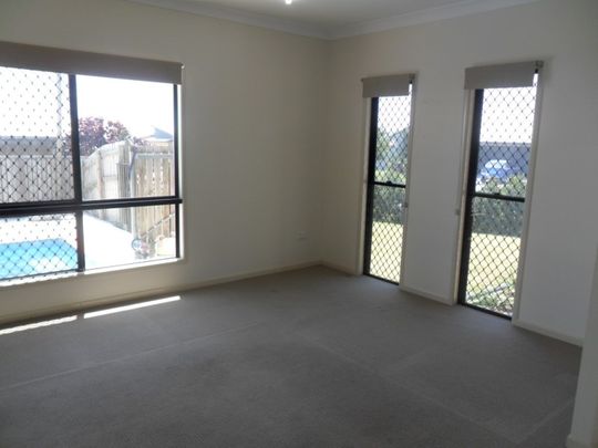 Spacious 4-Bedroom Family Home Near the Beach with a Pool! - Photo 1