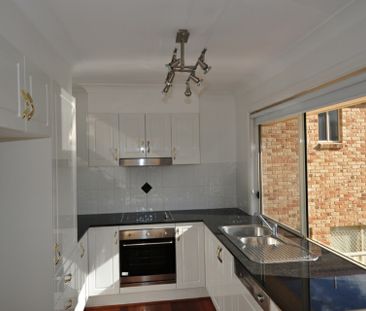 Townhouse in Ideal Location - Photo 1