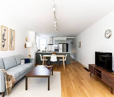 Inviting 2 Bed, 2 Bath with Private Garden, Office Den, and City Views - Photo 1