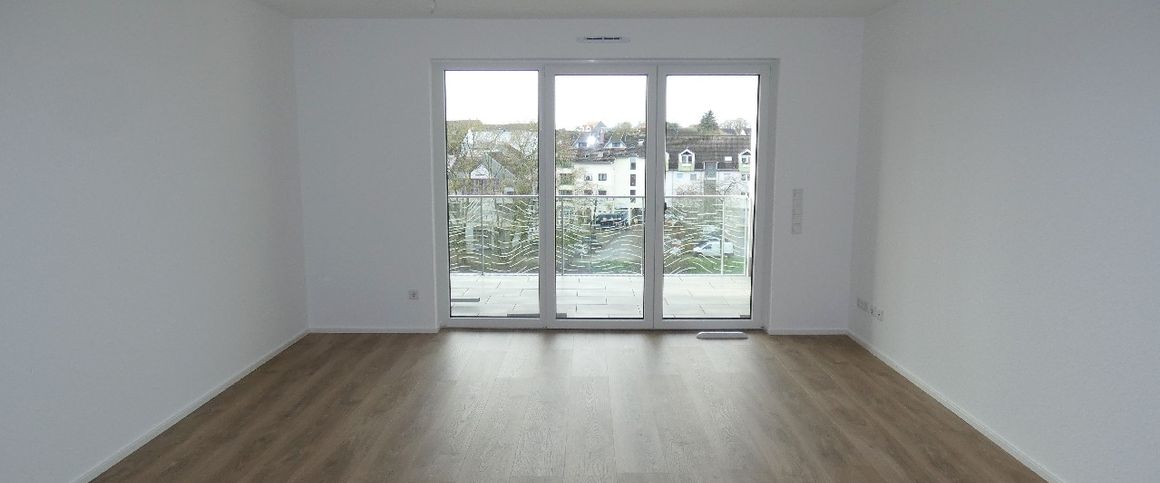 Neubau/Erstbezug: Modern geschnittene 3-Zimmer-Wohnung mit traumhaftem Ausblick! - Foto 1