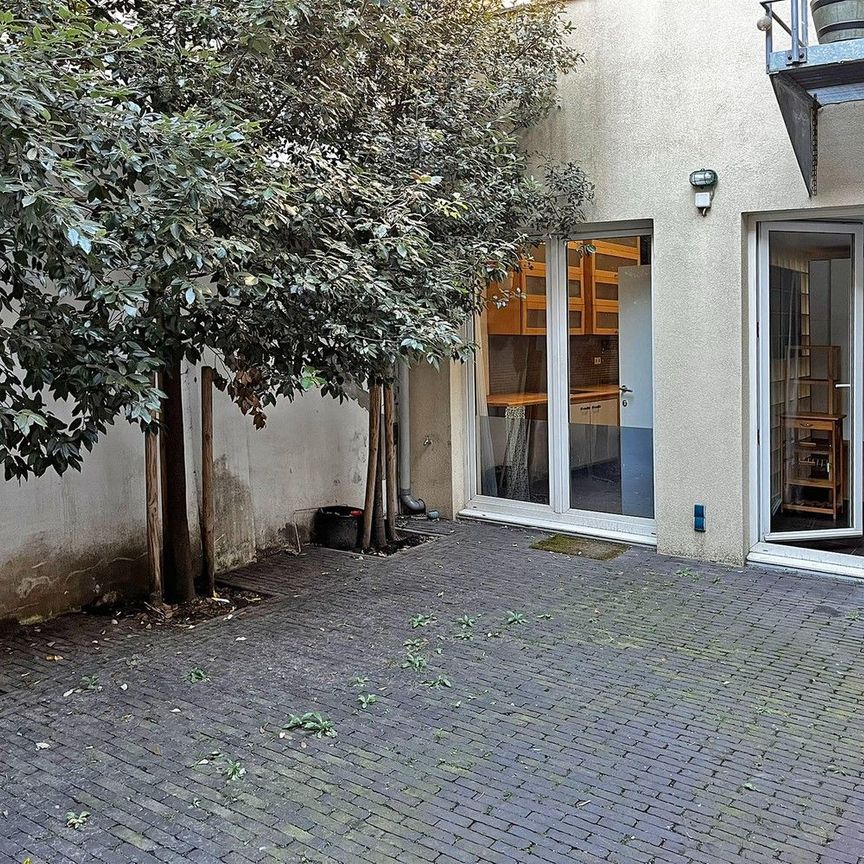 Centraal gelegen appartement met heerlijke buitenruimte - Foto 1