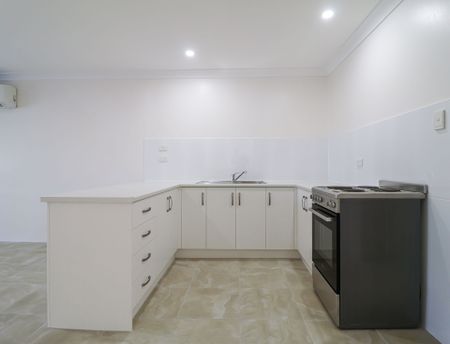 NEAT, TIDY & AIR-CONDITIONED - Photo 5