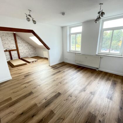 Helle Dachgeschosswohnung - Foto 1