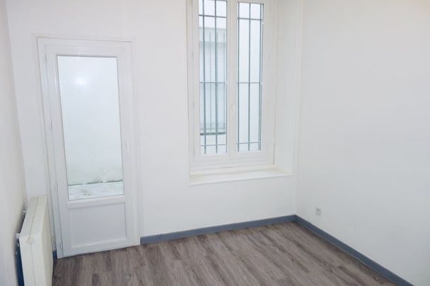 Location - Appartement T3 de 51 m², avec cour privative et cagibi - Photo 1