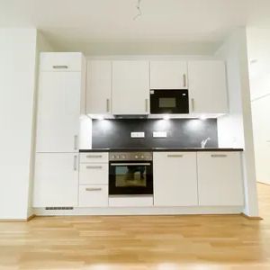Gepflegte 2-Zimmerwohnung mit Balkon im preisgekrönten Wohnquartier "THEOs" - Photo 3