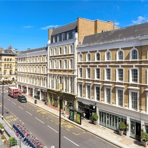 A three bedroom apartment of approximately 1,916 square feet. - Photo 2
