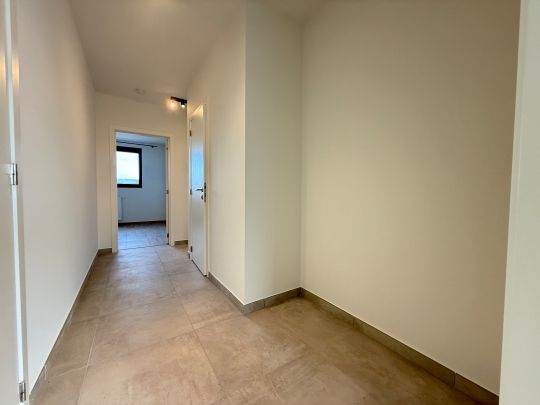 Twee-slaapkamerappartement op een centrale ligging in Ooigem. - Photo 1